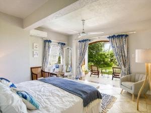 View of Primary Downstairs Garden Bedroom at La Paloma Beach Villa, Barbados.
